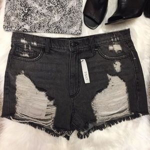 Distressed black denim shorts